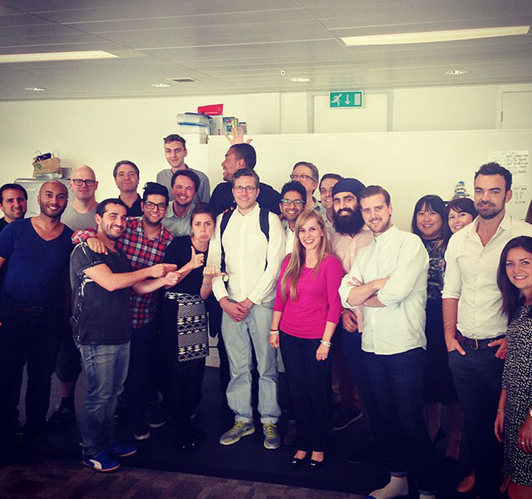 Anthoy Harrison surrounded by the Accenture/Karmarama acquired digital team he built
